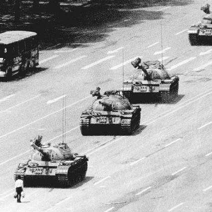 In the late 1940s, Orwell used many aspects of existing totalitarian and communist governments to construct the fictional government of Nineteen Eighty-Four. Pictured here are Chinese army tanks bearing down on a man during the Tiananmen Square uprising o