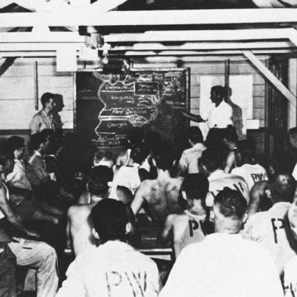 German prisoners of war in a re-education class taught by an anti-Nazi prisoner of war.