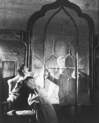 Tenor Peter Pears (right) as Quint in a 1954 English Opera Group production of the novel